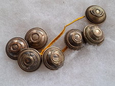 Un lot de 7 boutons militaire