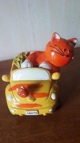 Tirelire chat volant une - chat, d'une