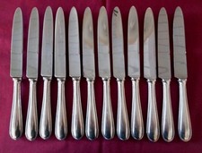 12 couteaux de table en métal