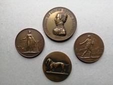 UN LOT DE 4  MEDAILLES EN BRONZE