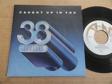 DISQUE 45T DE 38 SPECIAL   " CAUGHT UP IN YOU "