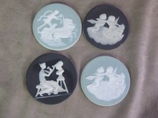 QUATRE PLAQUES en biscuit de LIMOGES. De Tharaud.
