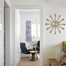 Horloge murale moderne George Nelson Vitra broche aluminium noyer massif Φ577 mm