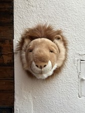 Tête de lion en peluche à