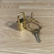 Cadenas LOUIS VUITTON doré