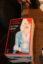 Livre 'La Cage Dorée' De