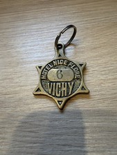 Ancien porte-clé d’hôtel