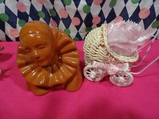 lot le pierrot gourmand céramique  et la poussette  berceau osier 