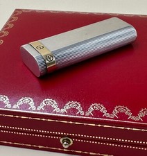 Chic briquet Le MUST de CARTIER en argent massif et plaqué or Love vintage