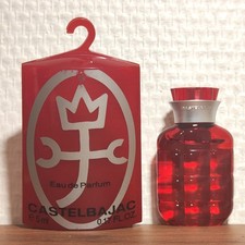 Eau de Parfum Castelbajac 5 ml. Boite Plastique rouge. Plein. Très bon état