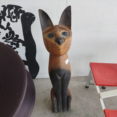 chat assis bois