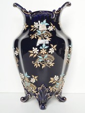 Ancien vase faïence de Gien décor de fleurs en émaux fond bleu de Sèvres 19ème.
