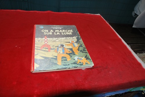 Tintin marché sur - a,
