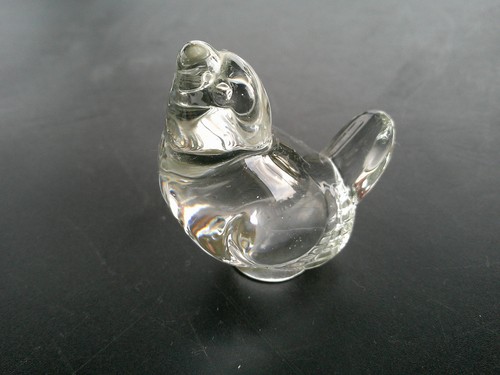 Statuette oiseau tete - tete, relevee