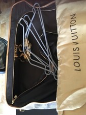 bagage vuitton état neuf