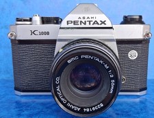Asahi Pentax K100 avec objectif  SMC 2/50 mm . Les vitesses fonctionnent.