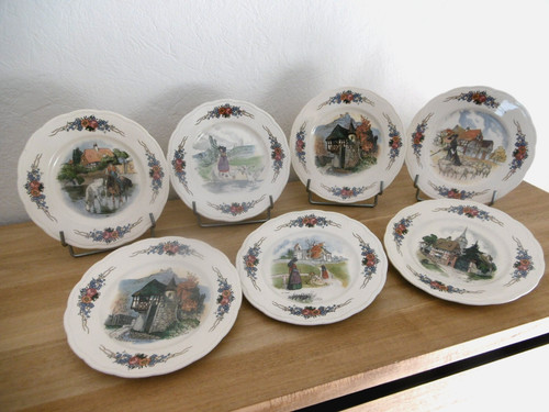 Sept assiettes dessert faience - assiettes,