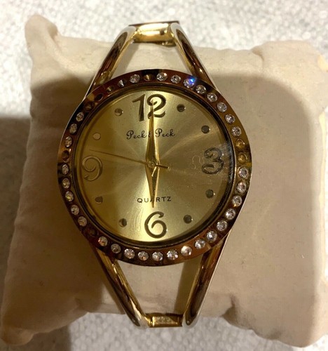 Peck ladies gold - &,