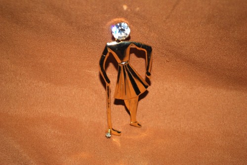 Vintage golden golfing woman - golden,