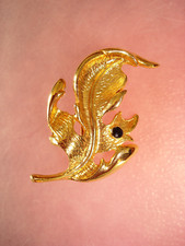 Broche ancienne vintage pierre noire et brillant plaqué or