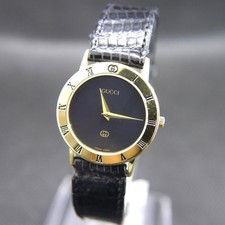Montre Gucci 3000J noire femme quartz 29 mm vintage ronde fabrication suisse