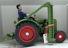 Tracteur avec faucheuse Farmer