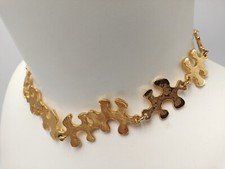 Joli collier puzzle signé - puzzle,