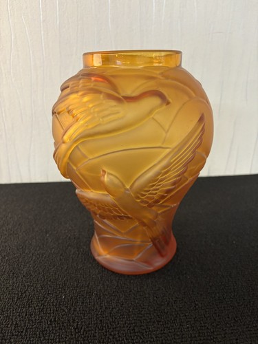 Vase aux oiseaux oranger - , dans