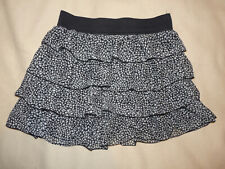 Jupe courte ample à volants