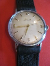 DOXA/ ANCIENNE MONTRE MECANIQUE/BRACELET CUIR NEUF/39MM/1963