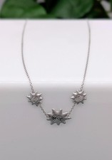 Collier avec 3 motifs spirales