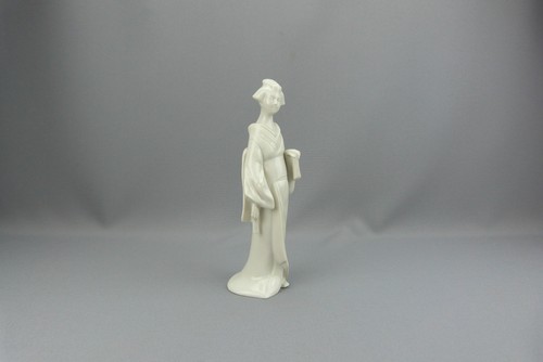 Figurine porcelaine de - en,