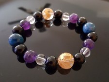 Hand carved onyx gold apatite