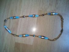 ancien sautoir en perle multicolore en bon état