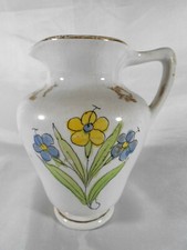 TRES BEAU PICHET A VIN / EAU DECOR FLORAL EN FAIENCE A IDENTIFIER .