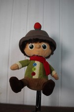 Peluche Parlante Migros Gnome chemise verte écharpe