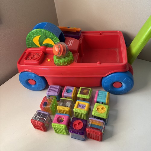 Fisher price peek block in - a,