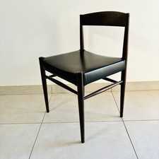 Chaise vintage scandinave en bois et skaï noir – design années 60