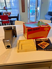 Polaroid portrait land camera