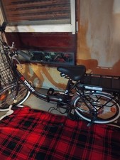 un velo electriQUE pliable toplife, etat neuf, noir, taille adulte