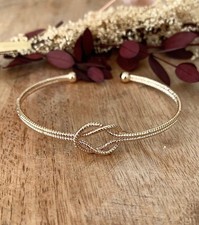 Bracelet jonc ouvert nœud en plaqué or 18 carats 750/000