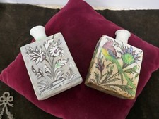 2 bouteilles indopersanes,à l'oiseau,H 16 et 17cm,P 500 et 600g