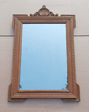 Ancien miroir en bois sculpté