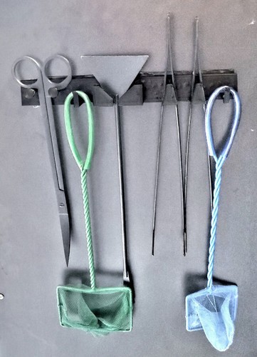 Support mural porte - mural, porte-outils
