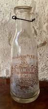 Bouteille de lait publicitaire ancienne Delattre-Willoquet