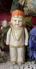 ANTIQUE POUPEE MIGNONETTE PETIT GARCON INDIEN EN PORCELAINE BRAS ARTICULES