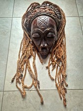 Masque Chokwe Mwana Pow tchokwe Angola en bois sculpté et cordes art africain