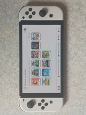 Nintendo Switch OLED + 10 jeux dématérialisés – Garantie 2026 – Très bon état