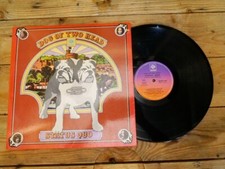 STATUS QUO DOG OF TWO HEAD 33T