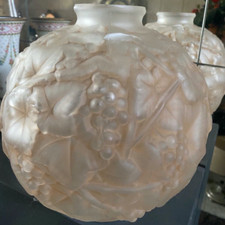 Vase boule en verre orangé